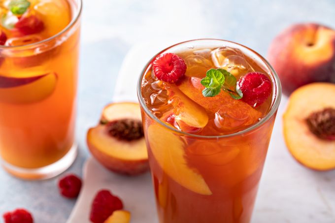Peach and raspberry iced tea or cocktail